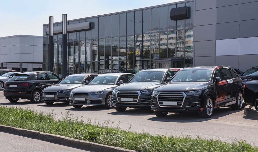 a view of the outside of a dealership that has benefited from an automotive advisor