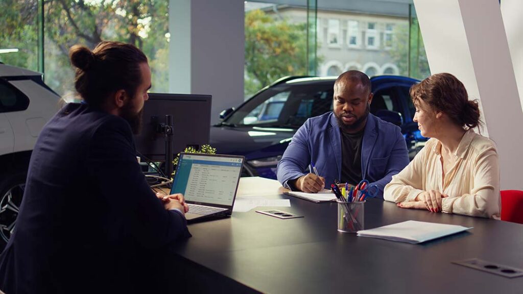 Couple purchasing subscription products for their vehicle subscriptions
